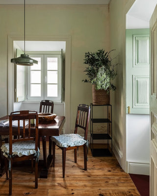 “Layered sculptural table and wall lighting in a cosy UK home – Ruby Watts”